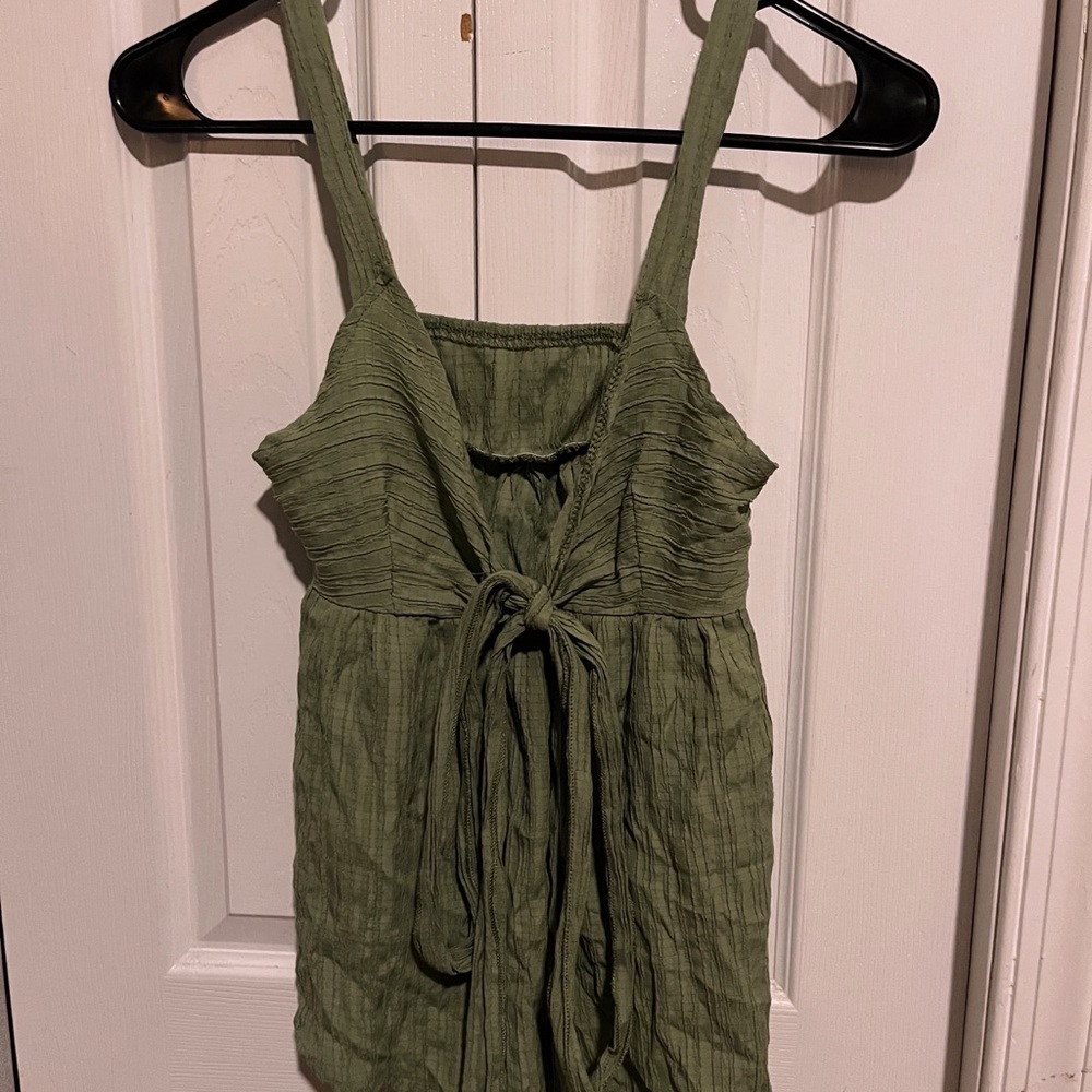 green sleeveless tie-front top